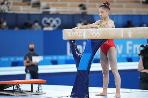 Guan Chenchen of China wins gold. Biles takes bronze.