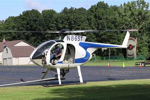 Helicopter helps First Energy prune trees in Akron, Canton