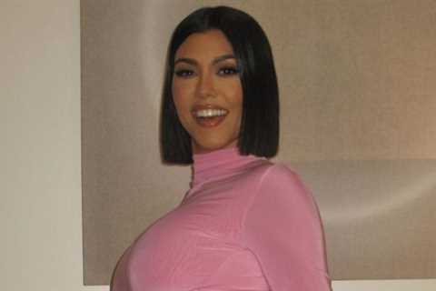 Kourtney Kardashian Wore Husband Travis Barker’s Boxers Under a High-Slit Pink Dress—See Pics