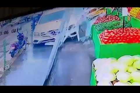 Car hits woman then crashes into fruit stand, vehicle in Queens