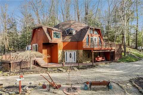 $569,000 Lake County Dome Home sits on 17 acres with four waterfalls |  Cleveland