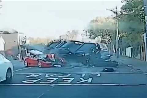 Terrifying moment £320,000 Ferrari smashes into two other cars leaving it a mangled wreck in horror ..