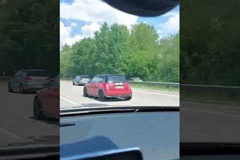 Kermit the Frog casually drives down highway