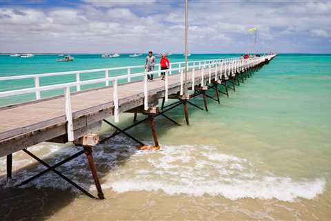 Woman savaged by shark in bloody double attack in front of horrified beachgoers as she’s left..