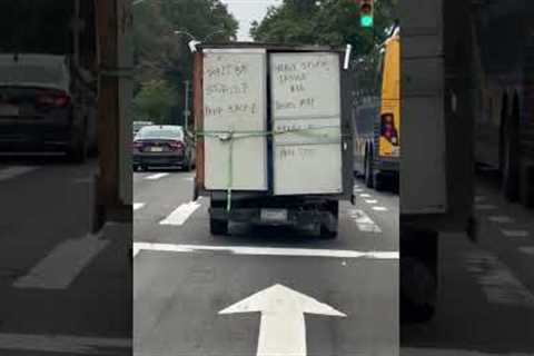 Overstuffed box van has sassy warning