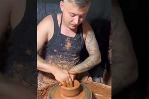 Master potter demonstrates artistry in creating pot and lid