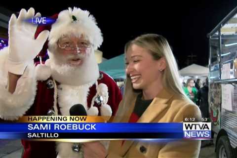 WTVA's Sami Roebuck talks to Santa at Saltillo's Sip and Shop event