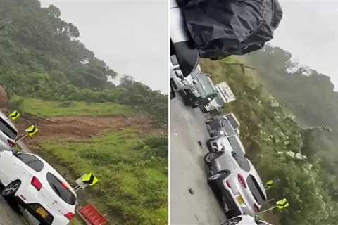 Shocking moment mountain collapses after heavy rain in Colombia leaving at least 18 dead including..