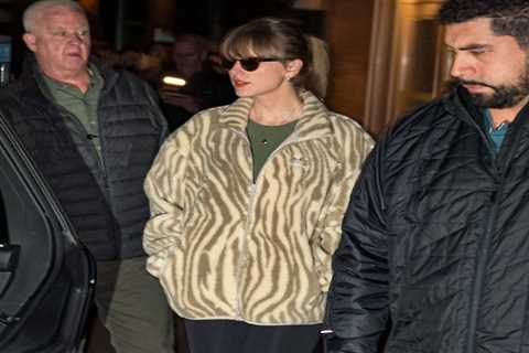 Taylor Swift seemingly wore a necklace that honored Kobe Bryant and made a statement about her..