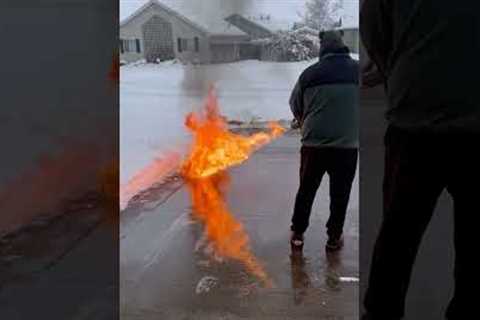 Dad Uses Flamethrower For Snow Removal