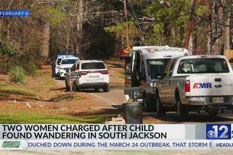 Two women charged after child found wandering in South Jackson