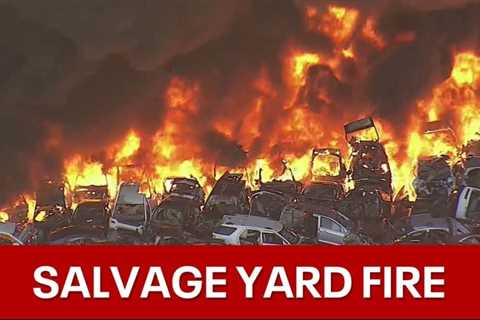 Grand Prairie auto salvage yard fire sends thick black smoke into air