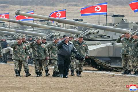 Kim Jong Un In Leather Jacket Drives N Korea's New Tank In Mock Battle