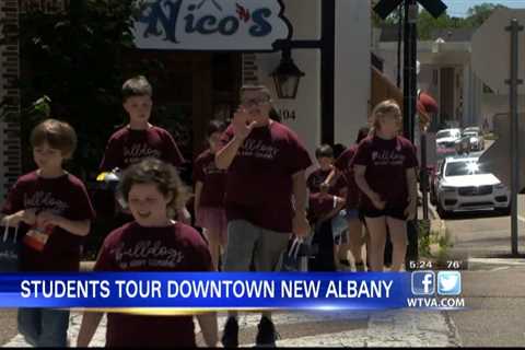 Students in New Albany take a tour of the city