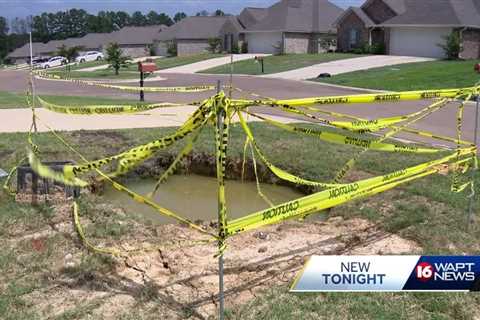 Brandon couple looks for answers after sinkhole forms caused by repair crew