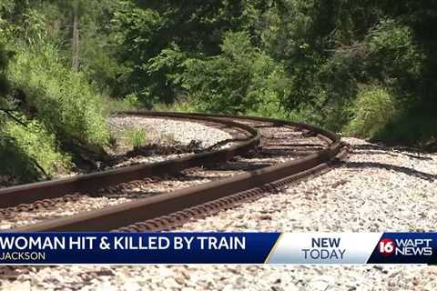 Woman killed after she was hit by a train