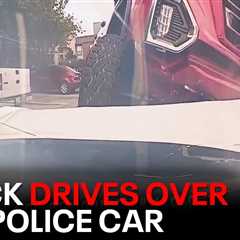 Dramatic video shows stolen pickup truck ramming Dallas police car