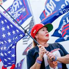 Trump promotes pins with the American flag and his name emblazoned in gold