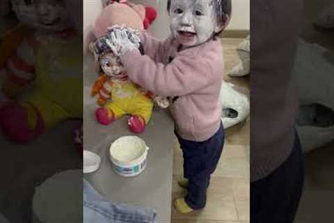 Toddler and Her Doll Get Covered in Cream