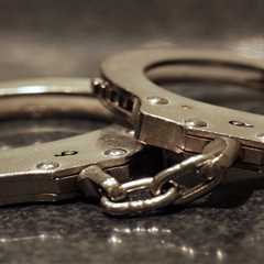 Aide to MP Arrested for Alleged Malicious Facebook Post